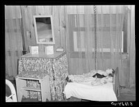 Homemade furniture in the bedroom of a project family's home at La Delta Project. Thomastown, Louisiana. Sourced from the Library of Congress.