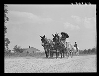 One of project families going home after purchasing supplies and groceries at their co-op store. Transylvania Project, Louisiana. Sourced from the Library of Congress.