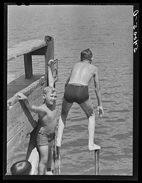 On Saturday afternoons and Sundays boys and children from nearby farms and neighborhoods go swimming in Lake Providence, Louisiana. Sourced from the Library of Congress.