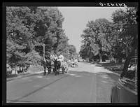 [Untitled photo, possibly related to: Returning home with wagons loaded with entire family and supplies on Saturday evening. Lake Providence, Louisiana]. Sourced from the Library of Congress.