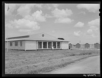 [Untitled photo, possibly related to: Children leaving health clinic after getting typhoid antitoxin shots at Osceola migratory labor camp. Belle Glade, Florida]. Sourced from the Library of Congress.