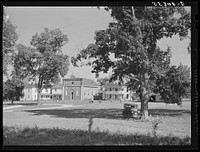 Church and rectory on the grounds of Saint Thomas' Church where a picnic is to be held. Near Bardstown, Kentucky. Sourced from the Library of Congress.