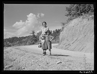 Mountain woman and child going home with groceries and supplies. Breathitt County, Kentucky. Sourced from the Library of Congress.