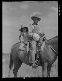 Melrose, Natchitoches Parish, Louisiana. Mulatto returning home after buying supplies at country store. Sourced from the Library of Congress.