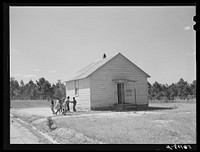 Williamson School, one-room school in Blanch, Caswell County, North Carolina. There were twenty children enrolled, only eight present, busy tobacco season. Sourced from the Library of Congress.