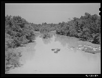Haw River from bridge on Highway 64 east of Pittsboro. Chatham County, North Carolina. Sourced from the Library of Congress.