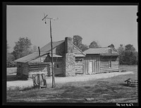 [Untitled photo, possibly related to: Tenant's home and lean-to kitchen. Caswell County, North Carolina]. Sourced from the Library of Congress.