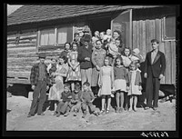 Noah Garland with his sons and some of their families. Southern Appalachian Project near Barbourville, Knox County, Kentucky. Sourced from the Library of Congress.
