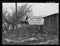[Untitled photo, possibly related to: Religious sign in front of house on highway between Columbus and Augusta, Georgia. Similar religious signs were placed along this highway at intervals of at least a mile and often much closer together]. Sourced from the Library of Congress.