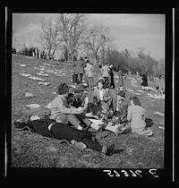 Spectators picnicking before the Point-to-Point Cup race of the Maryland Hunt Club. Worthington Valley, near Glyndon, Maryland. Sourced from the Library of Congress.