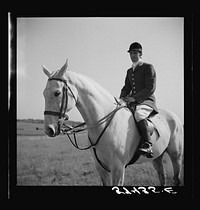 [Untitled photo, possibly related to: Outrider at Point-to-Point Maryland Hunt Club races. Worthington Valley, near Glyndon, Maryland]. Sourced from the Library of Congress.