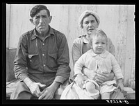 Spanish muskrat trapper, his wife and their adopted child by their marsh camp. Delacroix Island, Saint Bernard Parish, Louisiana. Sourced from the Library of Congress.