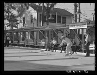 [Untitled photo, possibly related to: Playing shuffleboard. Sarasota trailer park, Sarasota, Florida]. Sourced from the Library of Congress.