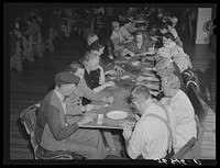 [Untitled photo, possibly related to: Guests of Sarasota trailer park, Sarasota, Florida, enjoying an evening of "bingo"]. Sourced from the Library of Congress.