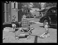 Children playing outside their trailer homes at Sarasota trailer park. Sarasota, Florida. Sourced from the Library of Congress.