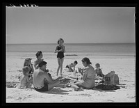 Members of Sarasota trailer park, Sarasota, Florida, picnicking at the beach. Sourced from the Library of Congress.