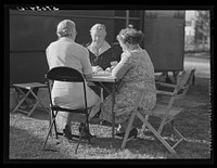 [Untitled photo, possibly related to: Guests of Sarasota trailer park playing Chinese checkers. Sarasota, Florida]. Sourced from the Library of Congress.