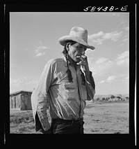 [Untitled photo, possibly related to: Cheyenne Indian on Tongue River Reservation near Lame Deer, Montana]. Sourced from the Library of Congress.