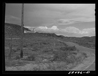 [Untitled photo, possibly related to: Sign at crossroads pointing direction to nearest telephone in ranch country. Birney, Montana]. Sourced from the Library of Congress.
