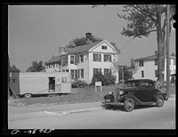[Untitled photo, possibly related to: Many private homes in East Hartford, Connecticut are using all of their available yard space for parking areas for defense workers. Often trailers are sold there too]. Sourced from the Library of Congress.