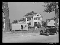 Many private homes in East Hartford, Connecticut are using all of their available yard space for parking areas for defense workers. Often trailers are sold there too. Sourced from the Library of Congress.