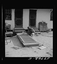 [Untitled photo, possibly related to: Metal reinforcing is placed over joints on inside face. Demonstration of home screen door construction. Saint Mary's County, Ridge, Maryland]. Sourced from the Library of Congress.