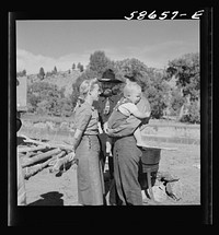 [Untitled photo, possibly related to: Spear's Siding, Wyola, Montana. Lyman Brewster of Quarter Circle U Ranch with Sally Rand and her father, Turk Greenough, at a stockmen's picnic and barbecue]. Sourced from the Library of Congress.