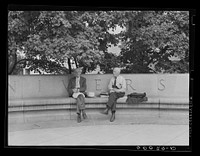 [Untitled photo, possibly related to: In front of the public library. Washington, D.C.]. Sourced from the Library of Congress.