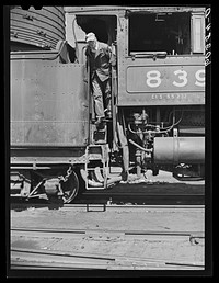 Railroad locomotive in grain elevator district. Minneapolis, Minnesota. Sourced from the Library of Congress.