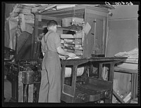 Operating press in office of Litchfield Independent. Litchfield, Minnesota. Sourced from the Library of Congress.