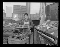 Sawing lead blocks for making cuts. Office of the Valley News. Browns Valley, Minnesota. Sourced from the Library of Congress.