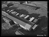 Trucks loading at terminal warehouse. Minneapolis, Minnesota. Sourced from the Library of Congress.