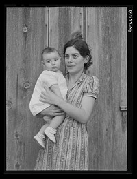 Mother and child living on Ozark Mountain farm, Missouri. Sourced from the Library of Congress.