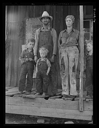 [Untitled photo, possibly related to: Ozark Mountain farmer and family. Missouri]. Sourced from the Library of Congress.