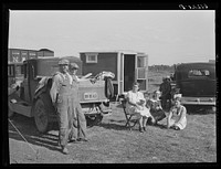 Migrant fruit workers. Berrien County, Michigan. One family has been on the road eighteen years, the other the past five years. Sourced from the Library of Congress.