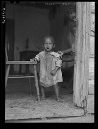 Youngest child of Edward Gant family, FSA (Farm Security Administration) borrowers. Saint Mary's County, Maryland. Sourced from the Library of Congress.