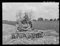 Breaking up cornstalks with disc. Grundy County, Iowa. Sourced from the Library of Congress.