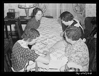 Making a quilt in Scranton, Iowa, home. The ladies will give the quilt to a needy family. Sourced from the Library of Congress.