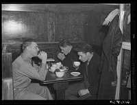 Men in a booth, Busy Bee Restaurant. Radford, Virginia. Sourced from the Library of Congress.