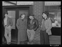 [Untitled photo, possibly related to: Men on the street in Radford, Virginia, just before change of shift]. Sourced from the Library of Congress.