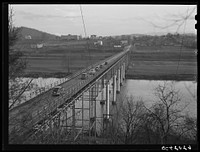Bridge into Radford, Virginia. The Hercules powder plant is seven miles out of town. Sourced from the Library of Congress.