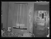 Steelworker who works on night shift in bed during day. Aliquippa, Pennsylvania. Sourced from the Library of Congress.