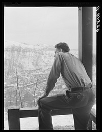 Steelworker on back porch of company house. Aliquippa, Pennsylvania. Sourced from the Library of Congress.