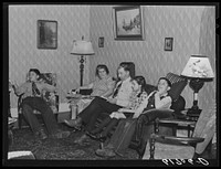 [Untitled photo, possibly related to: L.M. Schulstad, traveling salesman for hardware company, at home with his family. Aberdeen, South Dakota]. Sourced from the Library of Congress.