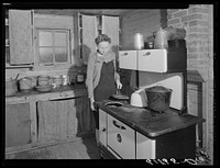 Kitchen in one of the scattered labor homes built by FSA (Farm Security Administration) at a cost of five hundred dollars. New Madrid County, Missouri. Sourced from the Library of Congress.