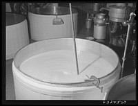 Swiss cheese cooking. Swiss cheese factory. Madison, Wisconsin. Sourced from the Library of Congress.
