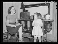 Wife and child of defense worker from North Carolina. They are living at Helping Hand Mission. Portsmouth, Virginia. Sourced from the Library of Congress.