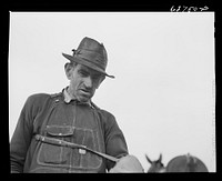 [Untitled photo, possibly related to: Farmer plowing cut-over land. Roanoke County, Virginia]. Sourced from the Library of Congress.