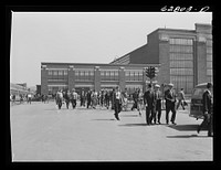 [Untitled photo, possibly related to: General Electric workers leaving the plant at 4:00 p.m. Another shift comes on immediately; they are running twenty-four hours. About 10,000 are now employed here and the figure is going up each week. Erie, Pennsylvania]. Sourced from the Library of Congress.