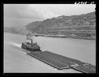 Pittsburgh, Pennsylvania. Coal barges on the river. Sourced from the Library of Congress.
